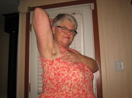 Fat nan Girdle Goddess shows her hairy armpits before revealing her saggy tits 11324459