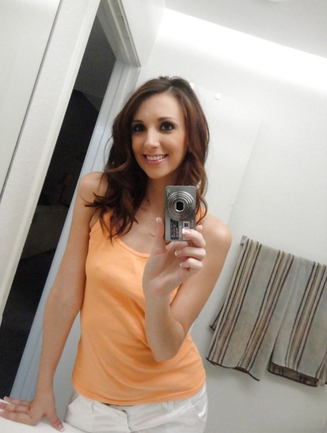Adorable chick shows off her naked forms while taking photos of herself 41092145